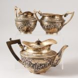 A VICTORIAN IRISH THREE PIECE TEA SERVICE comprising teapot, sugar basin and milk jug. Dublin