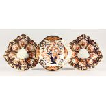 A CROWN DERBY SHELL DISH and TWO ROYAL CROWN DERBY DISHES. 25cms and 23cms (2).