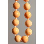A CORAL AND BEAD NECKLACE.