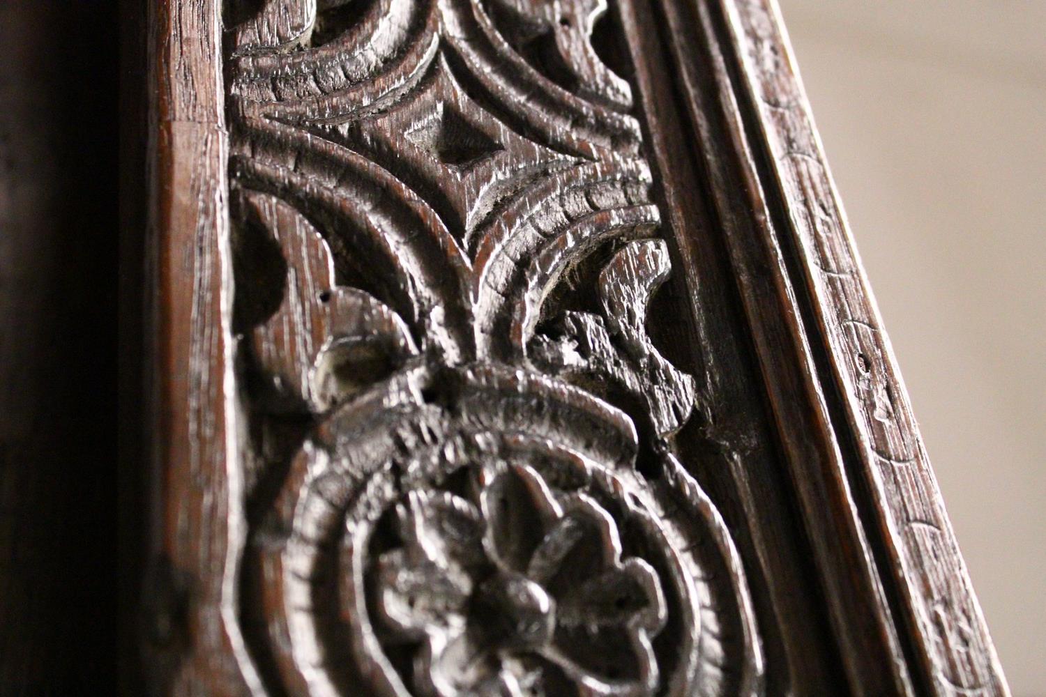 A 17TH/18TH CENTURY OAK COURT CUPBOARD, with carved frieze over two carved central panels flanked by - Image 10 of 10