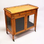 A GOOD 19TH CENTURY SATINWOOD CABINET, with a brass gallery, single frieze drawer over a pair of