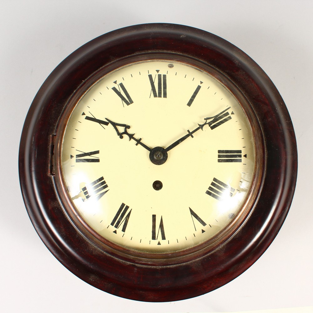 A MAHOGANY CASED CIRCULAR WALL CLOCK, with fusee movement. 30cms diameter.