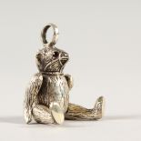 A SILVER TEDDY BEAR PENDANT.