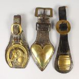 THREE LARGE ANTIQUE HORSE BRASSES ON LEATHER, "Heart", Barrel and Horse.