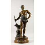 MAURICE CONSTANT (1892-1970) FRENCH. LE TRAVAIL. A good bronze figure, a man standing by an anvil,