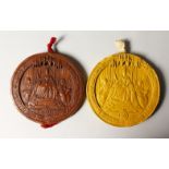 TWO GOOD LARGE WAX SEALS in tin cases. 6.5cms diameter.