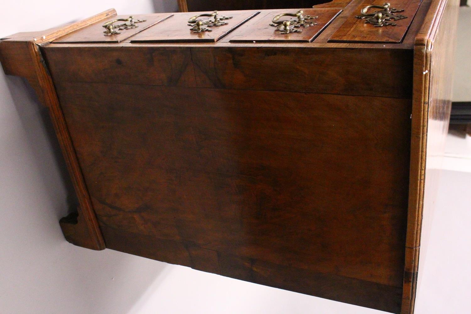 AN 18TH CENTURY WALNUT KNEEHOLE DESK, with quarter veneered top, one frieze drawer, a central - Image 6 of 17