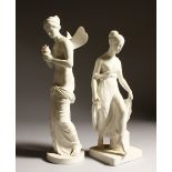A PAIR OF BERLIN WHITE CLASSICAL FIGURES. 30cms high. One slightly AF.