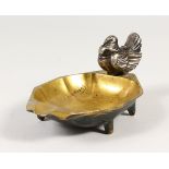 ALBERT MARIONNET (1852-1910) FRENCH A GILT BRONZE ASHTRAY, with a bird. Signed. 16cms long.