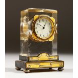 A GOOD SMALL FRENCH CRYSTAL AND YELLOW ENAMEL CLOCK. Maker: BS. 8cms high.