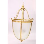 A LARGE BRASS AND FROSTED GLASS HALL LANTERN. 92cms high.