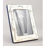 AN ART NOUVEAU SILVER PHOTOGRAPH FRAME. 19cms x 14cms.