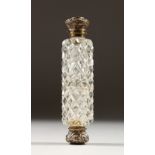 A VICTORIAN HOBNAIL CUT DOUBLE ENDED SCENT BOTTLE. 9.5cms long.