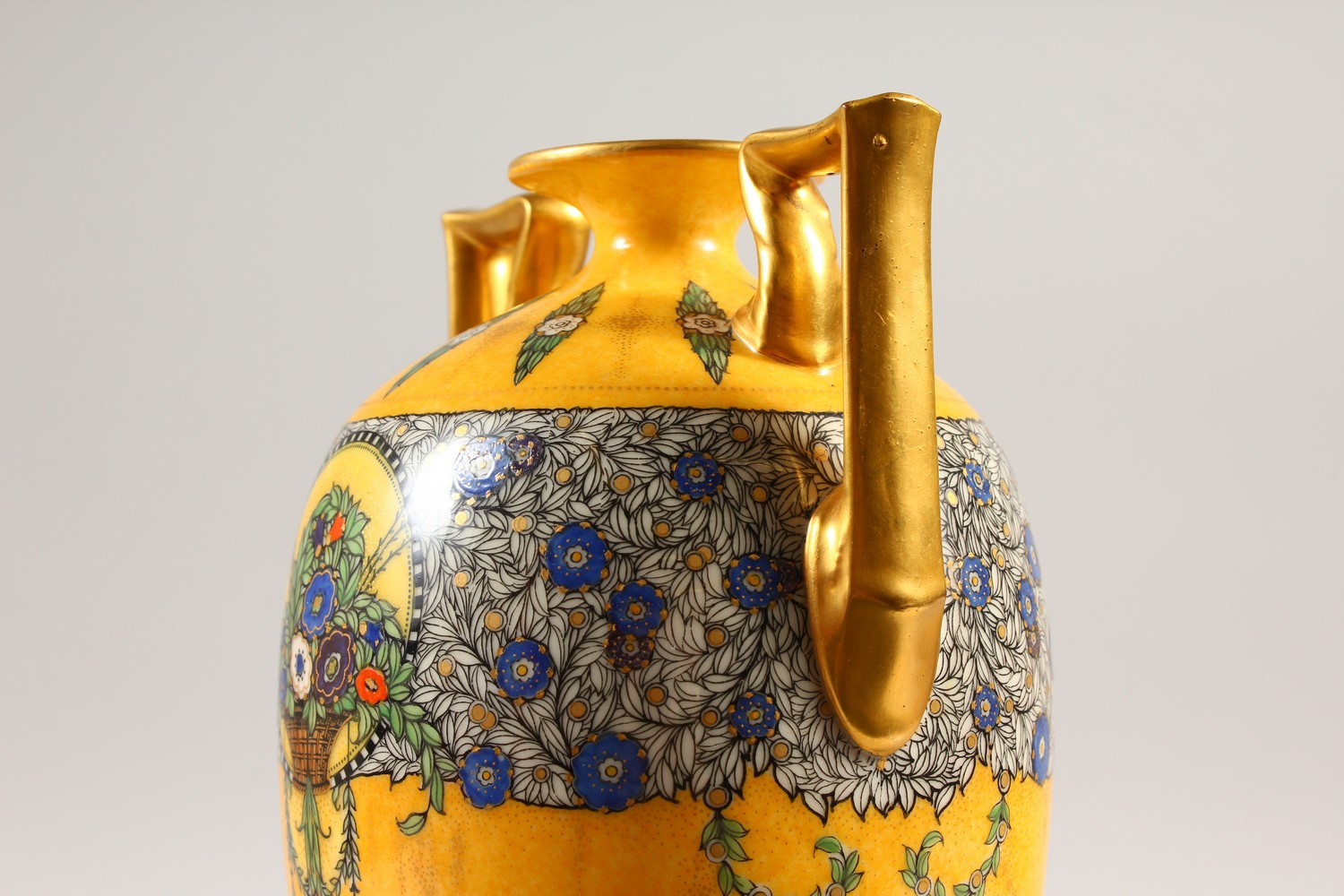 A ROYAL WORCESTER TWO-HANDLED VASE, with yellow ground painted with flowers and garlands. 28cms - Image 2 of 5