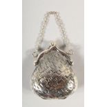 A SILVER PURSE.