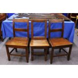 A PAIR OF 19TH CENTURY OAK CHAIRS, and a similar chair.