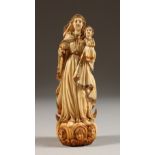 A VERY GOOD 19TH CENTURY IVORY CARVING OF THE MADONNA with gilt decoration. 5.75ins high.