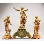 A 19TH CENTURY FRENCH ONYX AND GILT METAL GARNITURE DE CHEMINEE, comprising clock with winged
