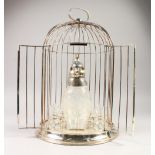 AN UNUSUAL BIRD CAGE COCKTAIL SET, with parrot shape decanter and eight glasses. 46cms high.