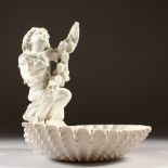 A COPELAND CHINA WHITE SHELL AND CUPID, holding a swag of pine cones. 23cms high.