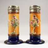 A PAIR OF ROYAL DOULTON STONEWARE SPILL VASES, with silver tops. Birmingham 1903. 14cms high.