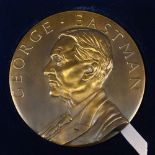 GEORGE EASTMAN BRONZE KODAK MEDALLION, in a blue case.