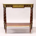 A FRENCH STYLE MAHOGANY AND ORMOLU TWO-TIER SIDE TABLE, with turned column supports. 104cms wide x