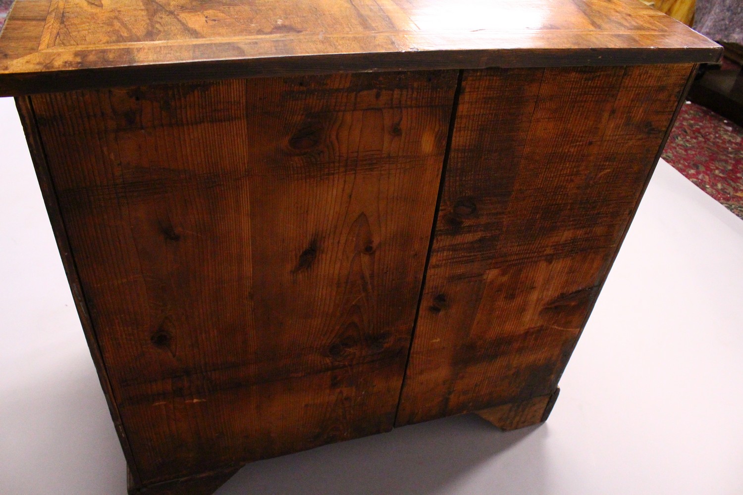 AN 18TH CENTURY WALNUT KNEEHOLE DESK, with quarter veneered top, one frieze drawer, a central - Image 7 of 17