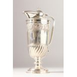 A GOOD VICTORIAN SILVER WINE EWER, semi fluted with a band of fruiting vines. Sheffield 1894. Maker: