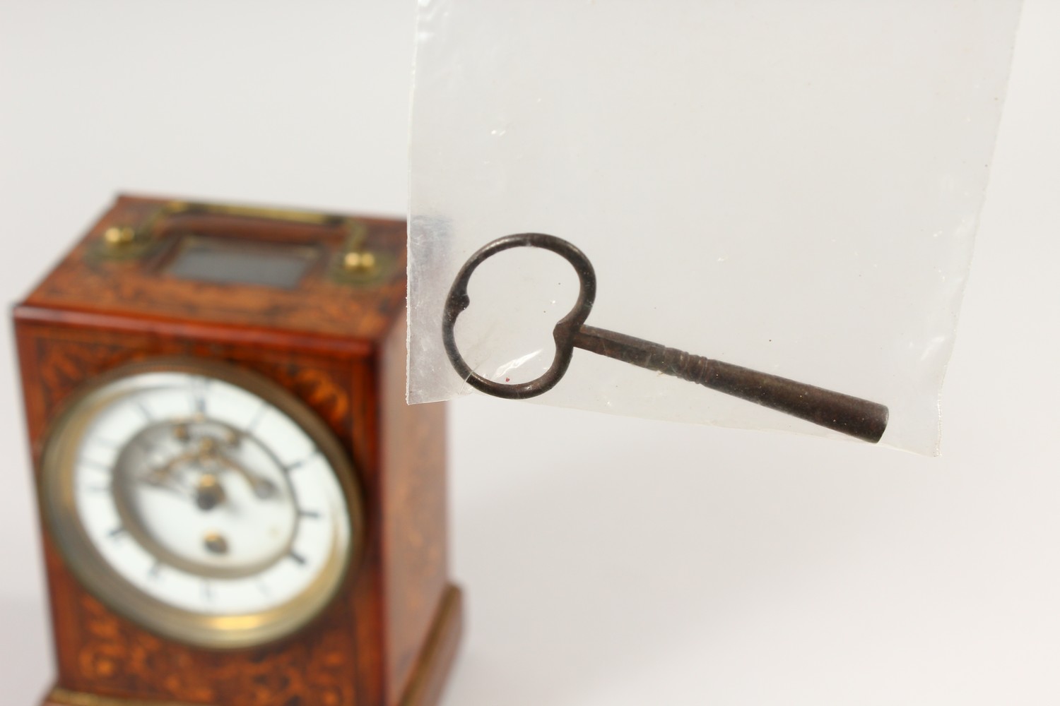 A 19TH CENTURY ROSEWOOD INLAID CLOCK, with white dial, Roman numerals and carrying handle. 18cms - Image 11 of 12