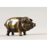 A BRASS PIG VESTA.