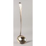 A GEORGE III BRIGHT CUT SOUP LADLE.