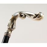 A CONTINENTAL ROSEWOOD WALKING STICK, with silver top. 95cms long.