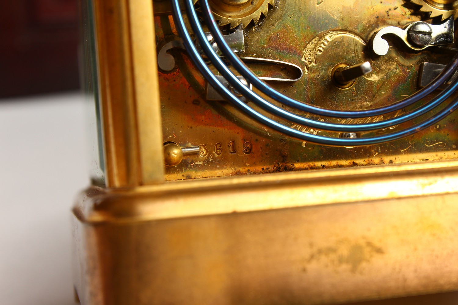 A FRENCH BRASS CARRIAGE CLOCK, with repeat and alarm, striking on a gong, in a leather case. 14cms - Image 8 of 14