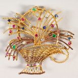 A VERY GOOD REGARD DIAMOND, RUBY AND SAPPHIRE BASKET BROOCH.