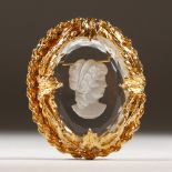 A GLASS CAMEO BROOCH.