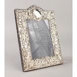 A SILVER UPRIGHT PHOTOGRAPH FRAME. 23cms high x 16cms wide.