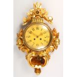 A FRENCH STYLE GILTWOOD CARTIER WALL CLOCK. 55cms high.