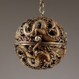 A CHINESE SILVER PIERCED BALL SHAPE CENSER. 5.5cms diameter.