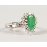 A GOOD 18CT GOLD, EMERALD AND DIAMOND TEARDROP RING.