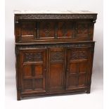 A 17TH/18TH CENTURY OAK COURT CUPBOARD, with carved frieze over two carved central panels flanked by