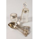 TWO SILVER TOP BOTTLES AND SPOONS.