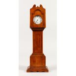 A MINIATURE MAHOGANY LONGCASE CLOCK with watch movement. 32cms high.