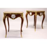 A PAIR OF FRENCH STYLE MARQUETRY AND ORMOLU CENTRE TABLES, each inset with porcelain panels, on