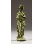 A SMALL , POSSIBLY ROMAN, BRONZE CLASSICAL FEMALE FIGURE. 2.5cms high.