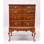 AN EARLY 18TH CENTURY WALNUT CHEST ON STAND, with two short and three graduated long drawers, on a