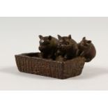 A MINIATURE CHINESE BRONZE OF THREE PIGS. 4.5cms.