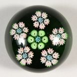 A MILLEFIORI PAPERWEIGHT. 2ins diameter.