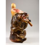 A MAJOLICA STYLE BEAR SHAPED JUG. 34cms high.