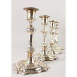 A SET OF FOUR GEORGIAN STYLE CANDLESTICKS. 18cms high. London 1903.